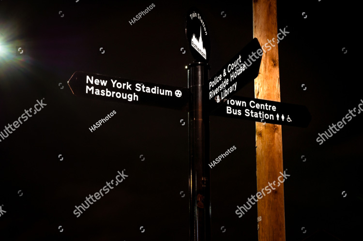 Stock Photo Signpost To Rotherham Town Centre Bus Station Library Police Station Court Riverside House 1113609215